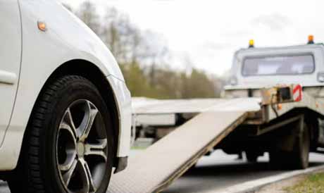 A vehicle being collected after its ownership paperwork is completed